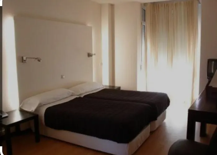 Hotel Asador Versus